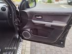 Suzuki Grand Vitara 2.4 Premium - 12