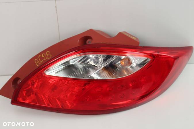 LAMPA PRAWY TYŁ TYLNA MAZDA 2 II 07-10R - 1