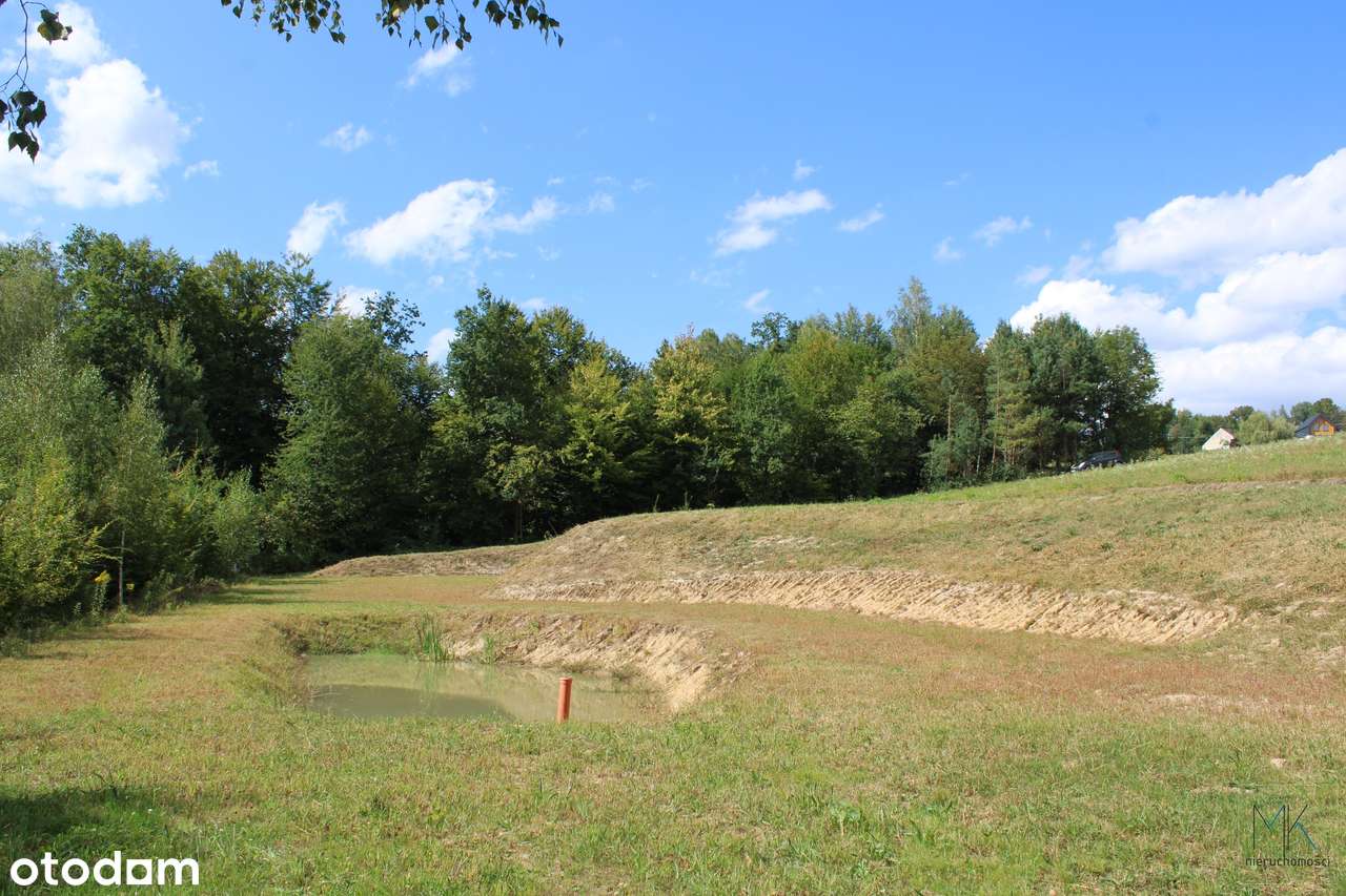 Kobylec, gmina Łapanów – działka budowlana z własnym stawem.-1