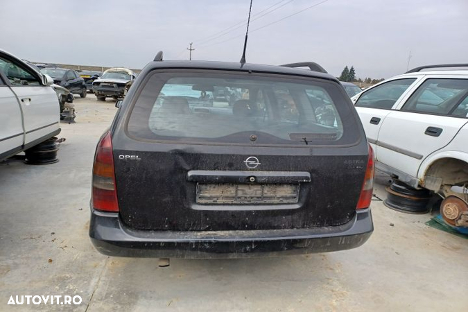 Planetara fata stanga Opel Astra G  [din 1998 pana  2009] seria wagon 5-usi 1.7 CDTi MT (80 hp) - 7