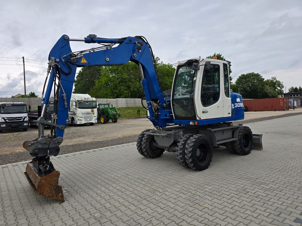 Liebherr 309 / ramie trzy razy łamane 2007