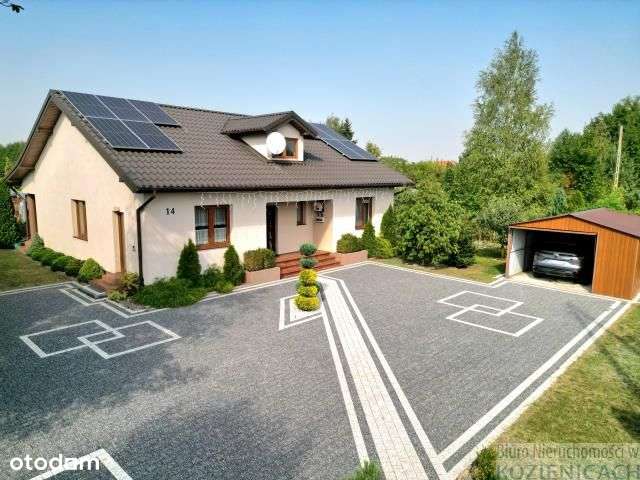 Nowoczesny dom z pięknym ogrodem.-14