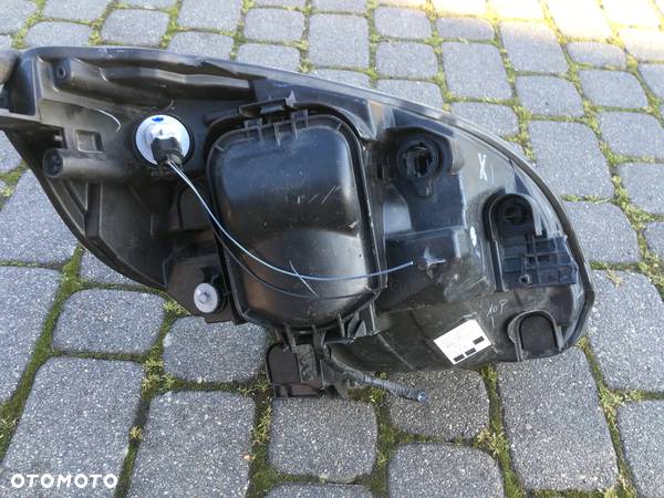 REFLEKTOR LEWY LAMPA LEWA PRZÓD KANGOO II LIFT 12- - 2