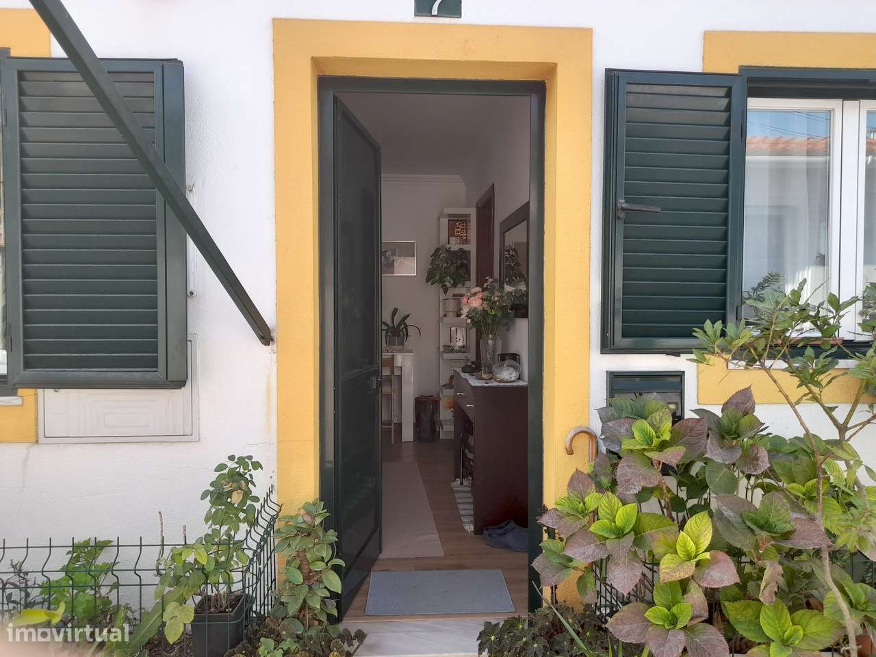 Moradia T1 com sótão e jardim em Campo de Ourique-18