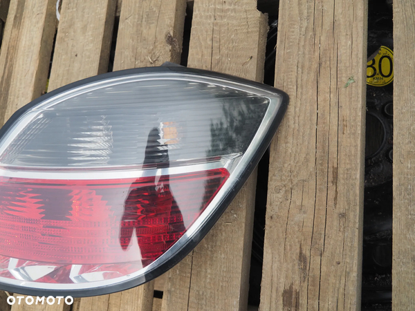 Lampa tył tylna prawa Opel Astra H III Lift 13222325 - 2