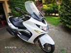 Kymco Xciting - 12