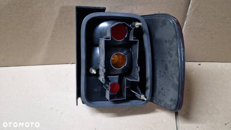 VOLKSWAGEN PASSAT B4 93-96 SEDAN  LAMPA TYL LEWA NOWA HELLA 9EL141889-041 - 2