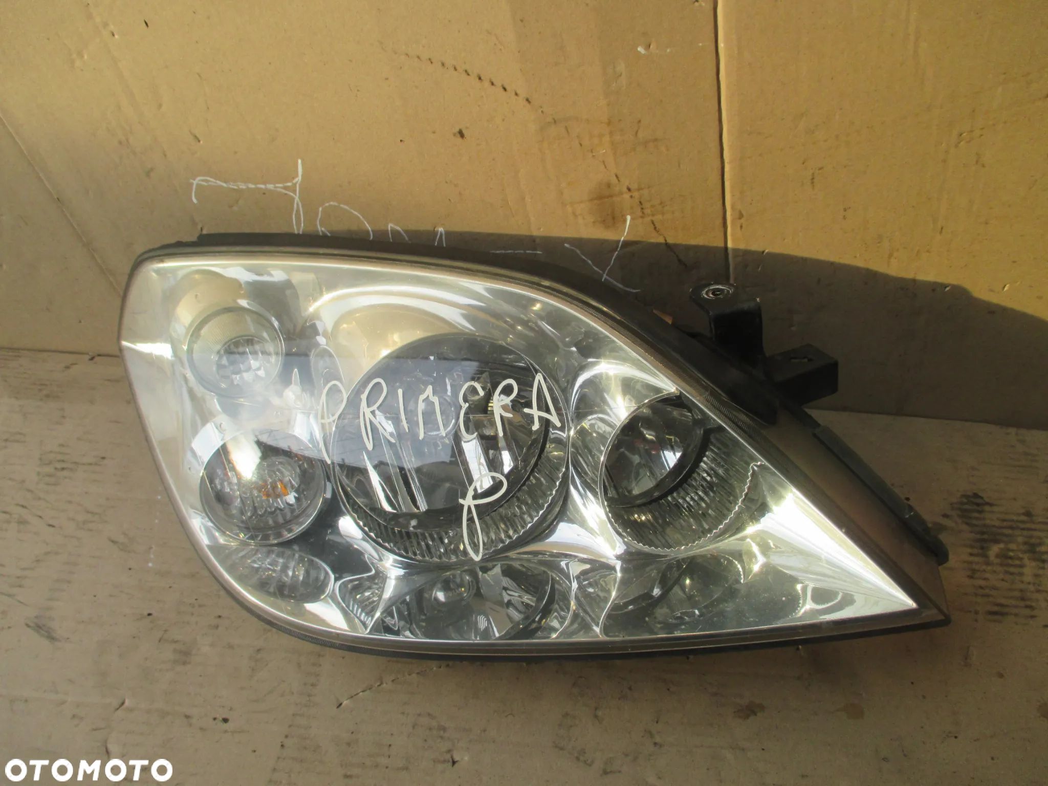 Lampa prawa NISSAN PRIMERA P12 HELLA EUROPA - 1