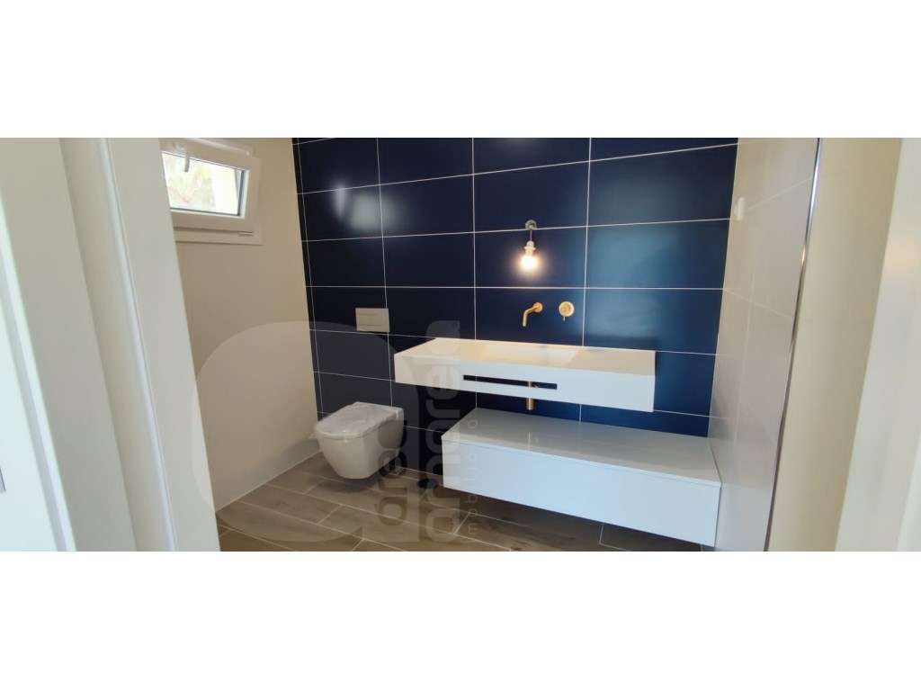 Moradia T3 isolada e térrea com garagem e piscina em Azeitão-5