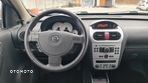 Opel Corsa 1.2 16V Cosmo - 23