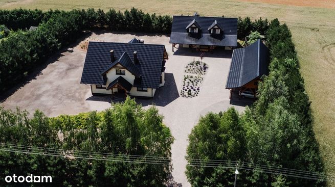 Dom z dużą działką, garaże, mieszkanie-4