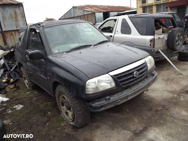 Dezmembrez Suzuki Grand Vitara 1.6 an 2003 motor cutie grup planetare - 1