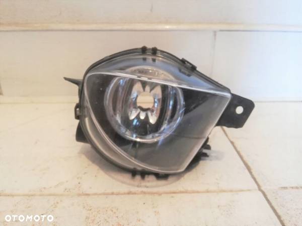 HALOGEN LEWY BMW E90 E91 LAMPA PRZECIWMGIELNA - 1