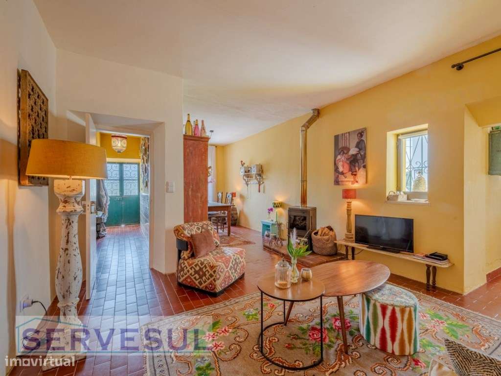 Charmosa moradia de 2 quartos de 121 m², inserida num terreno com 2...-7
