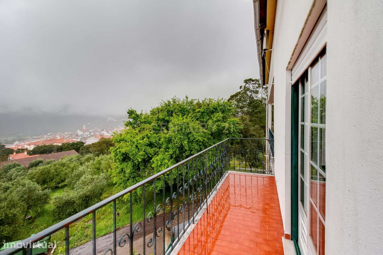 Prédio com 2 apartamentos+garagem+terreno-22