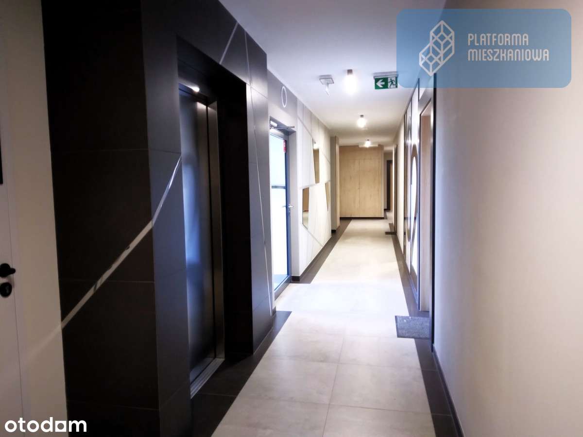 Mieszkanie z dodatkową toaletą i jasną kuchnią-2