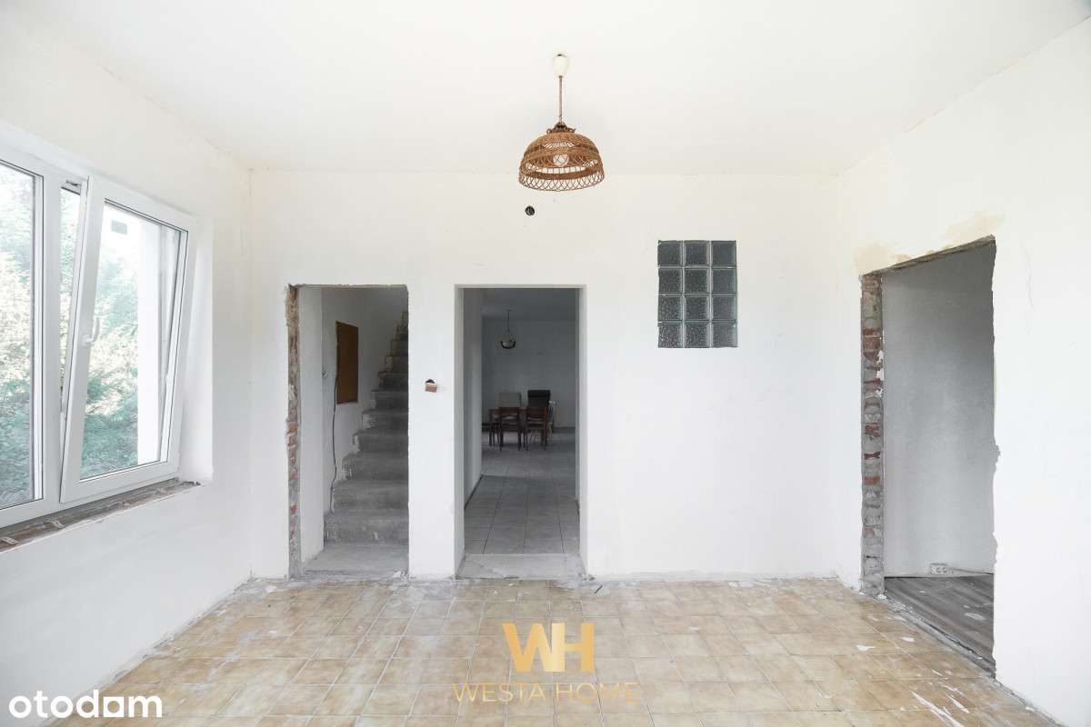 Dom wolnostojący w otoczeniu drzew. Zakroczym.-14