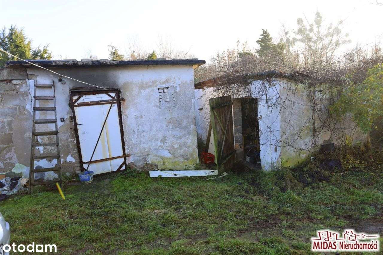 Dom do remontu na ładnej działce-18