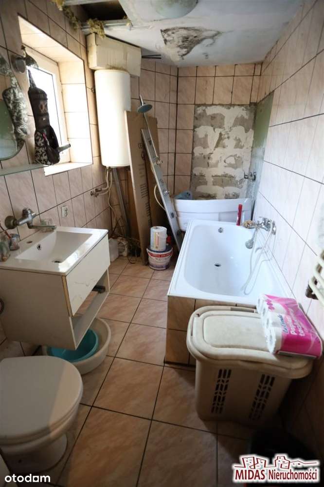 Dom do remontu na ładnej działce-17