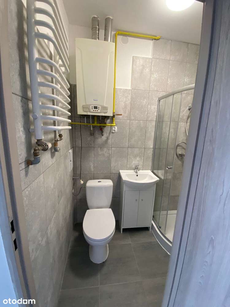 Wynajęta kamienica - 15 mieszkań, po remoncie-17