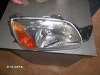 Ford Fiesta 99-01r lampa reflektor R - 1