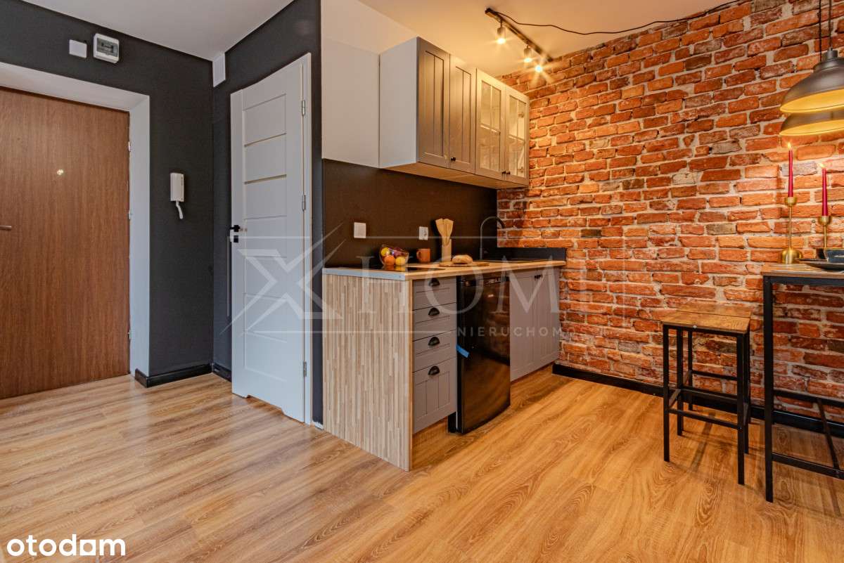 Wyjątkowa kawalerka w stylu loftowym-10