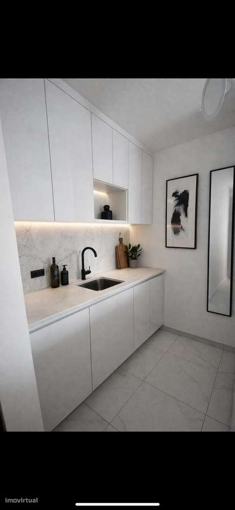 Fantástico T1 com varanda, lugar de garagem com vista para o S. João - Grande imagem: 3/8