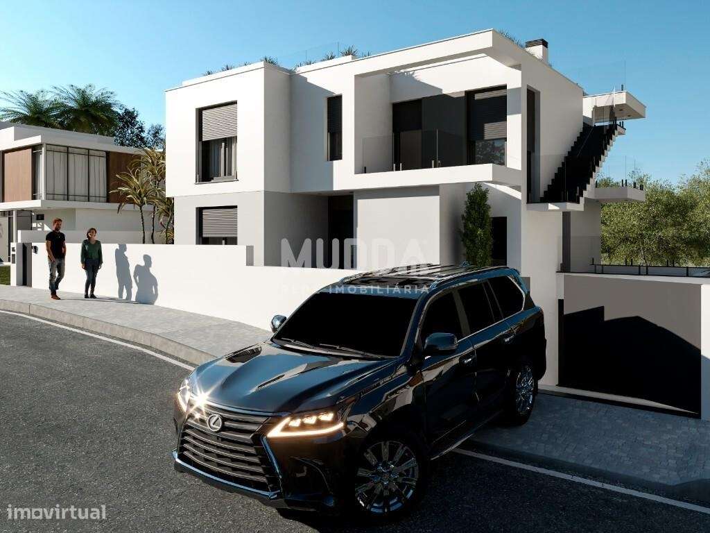 Moradia isolada de design contemporâneo nos Casais Mestre Mendo-5