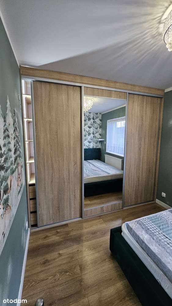 Przestronne 4-pokojowe mieszkanie z tarasem na dachu-12