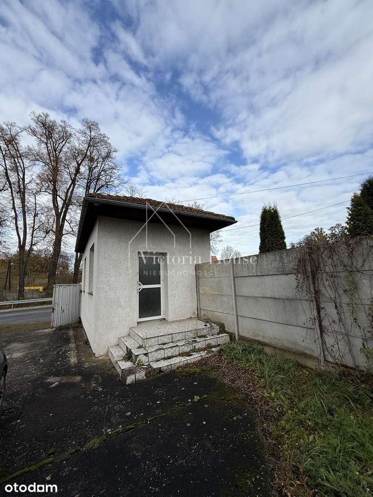 Teren usługowy z zabudowaniami.-16