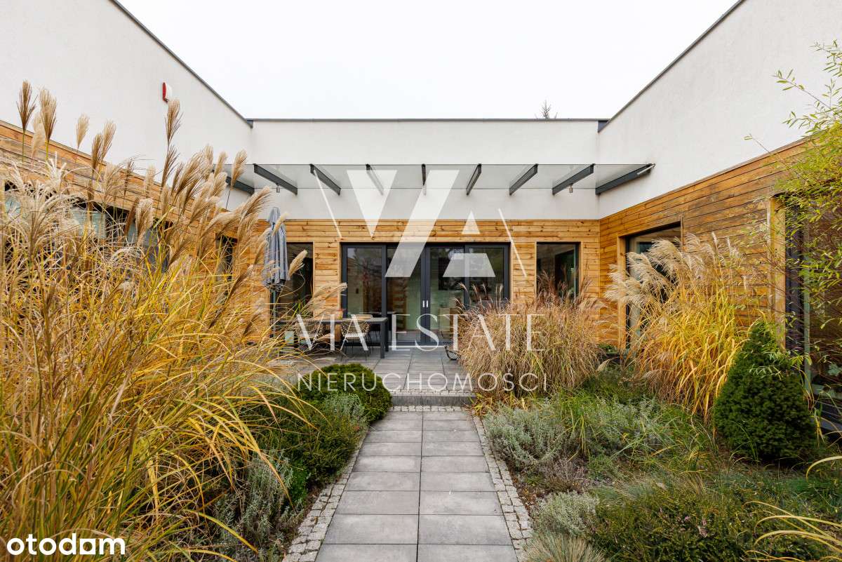 Parterowy nowoczesny dom w Konstancinie I 305m-12