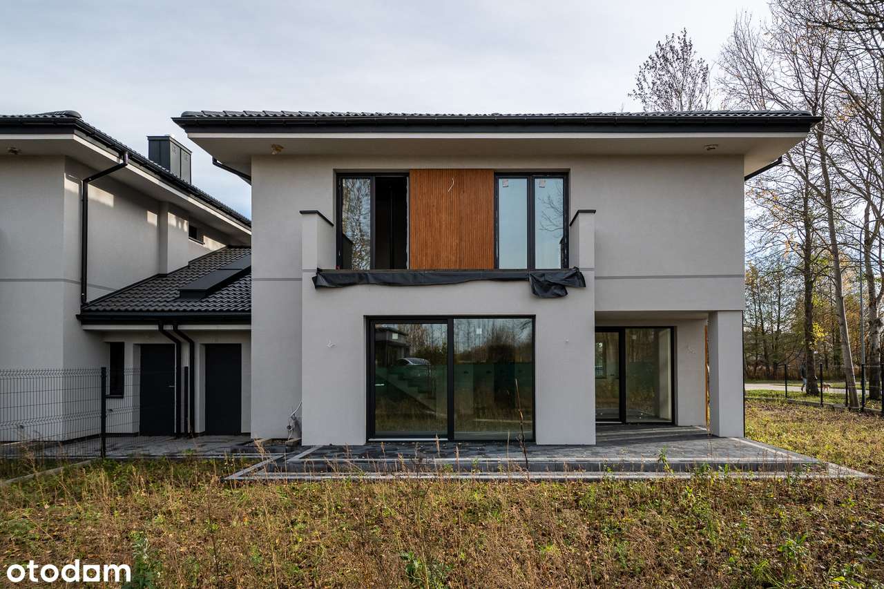 Duży bliźniak łączony 2-stan. garażem, niedaleko szkoła oraz trasy S7-3