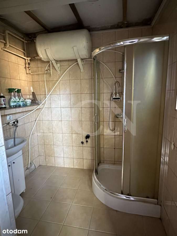 Dwa mieszkania w domu wielorodzinnym-9