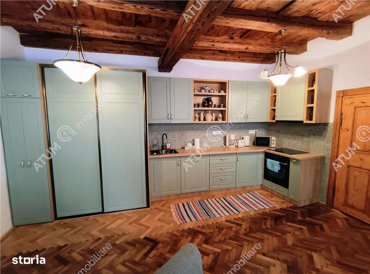 De inchiriat apartament unicat cu 2 camere langa Piata Mare din Sibiu - Imagine principală: 5/9