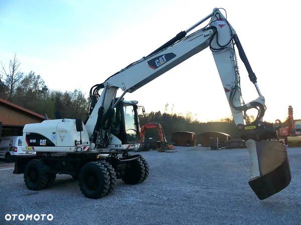 Caterpillar CAT M316D z Niemiec / 12.700mtg / - 10