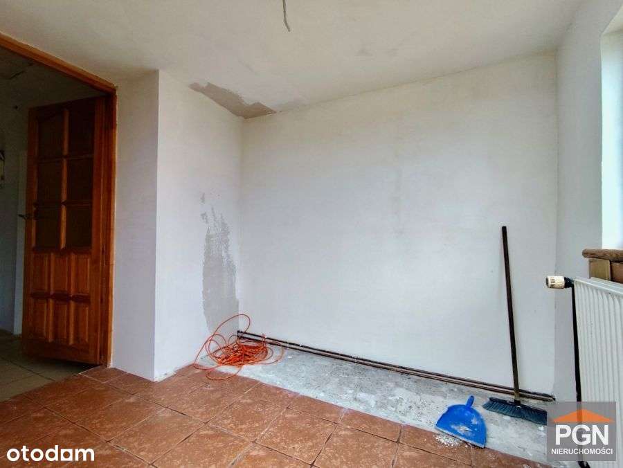 Połowa domu blisko centrum z działką-13