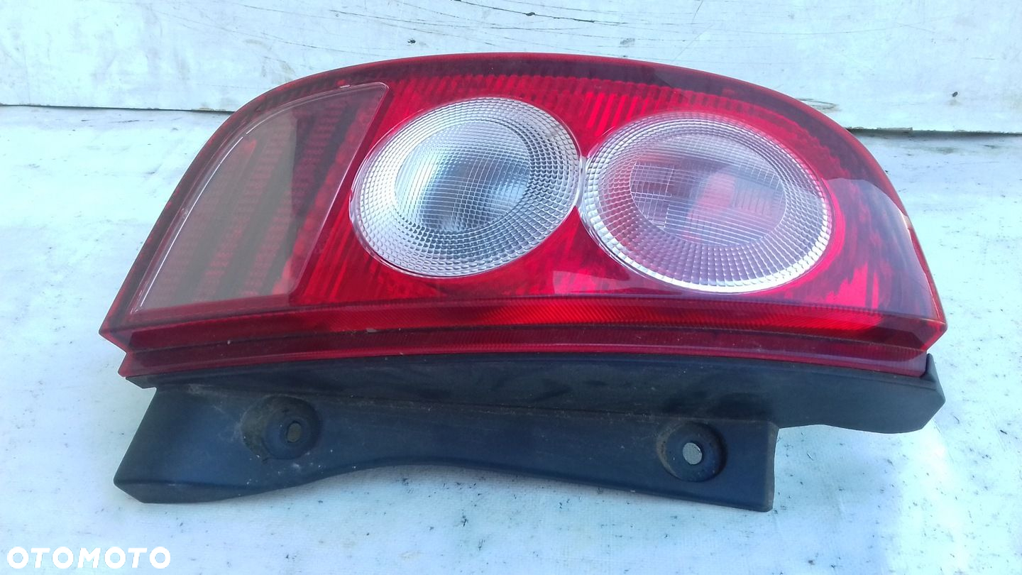 LAMPA LEWY TYŁ TYLNA NISSAN MICRA K12 03- - 2