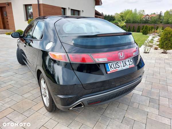 Honda Civic 1.8 Comfort - 14