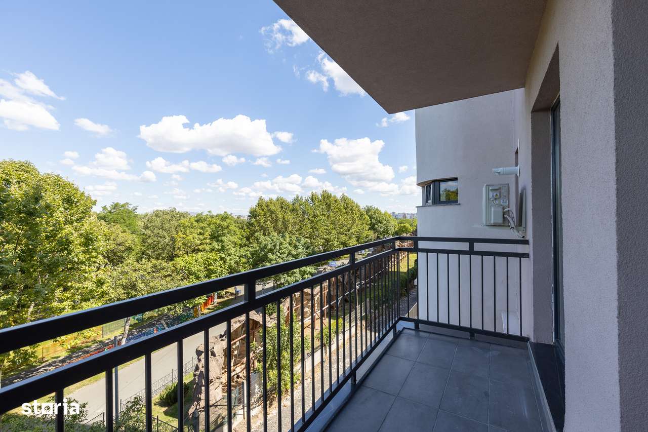 Garsoniera open space intima, etaj 8, cu balcon si priveliste in parc - Imagine principală: 3/14