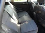 Opel Astra IV 1.4 T Cosmo - 11