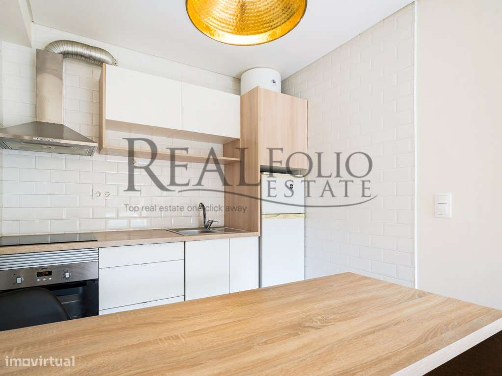Apartamento T1 remodelado com varanda na Costa da Caparica-5