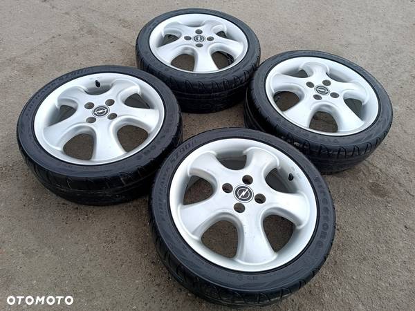 4x100 Felgi Aluminiowe Alufelgi 16 Koła Letnie Lato OPEL IRMSCHER CORSA B C COMBO ASTRA G H KARL TIGRA CALIBRA VECTRA DAEWOO CHEVROLET LEGNICA ALU-RAD 195/45 4mm - 3