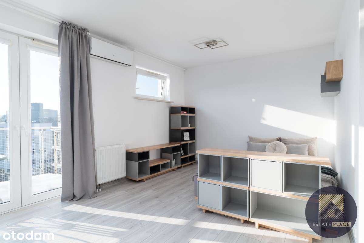 Funkcjonalna kawalerka z klimą i balkonem-1