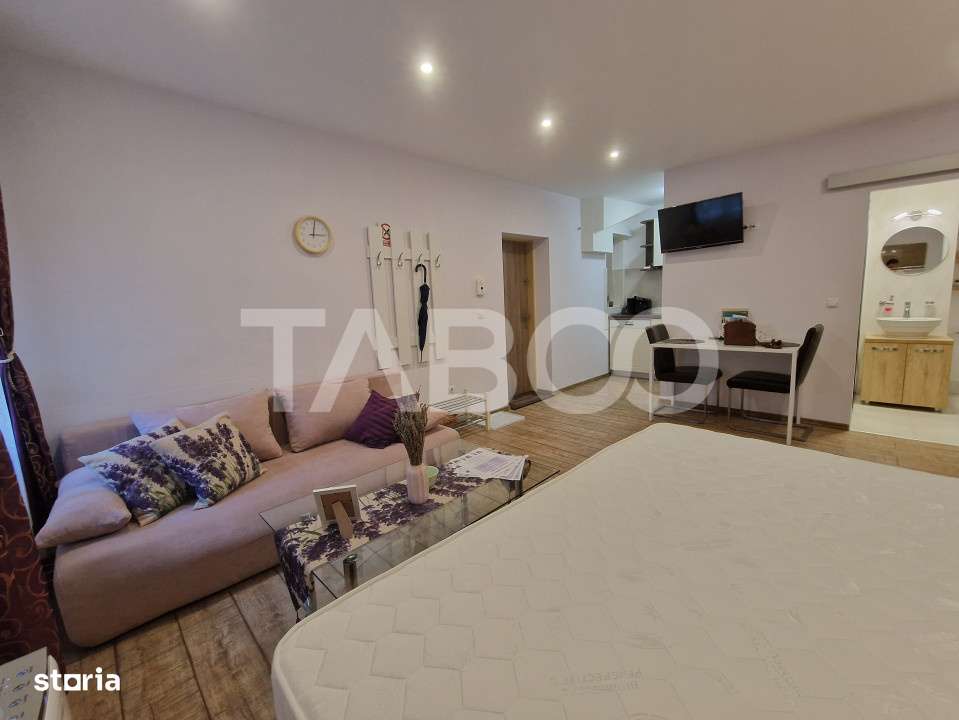 Garsoniera moderna 32mpu de inchiriat in centrul Sibiului - Imagine principală: 2/10