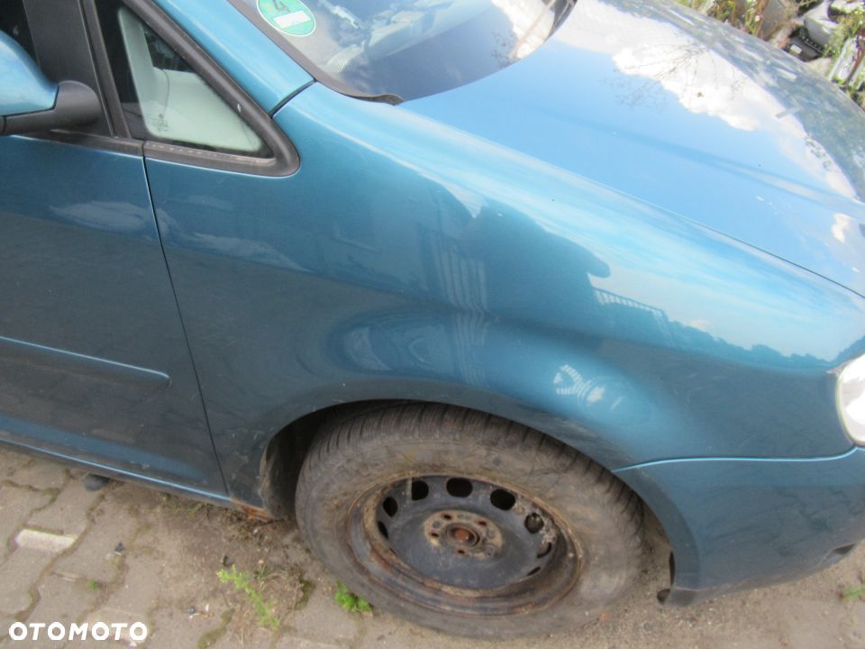 VOLKSWAGEN TOURAN I BŁOTNIK PRAWY - 1