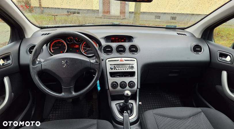 Peugeot 308 1.4 Trendy - 12