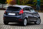 Ford Fiesta 1.4 Ghia - 21