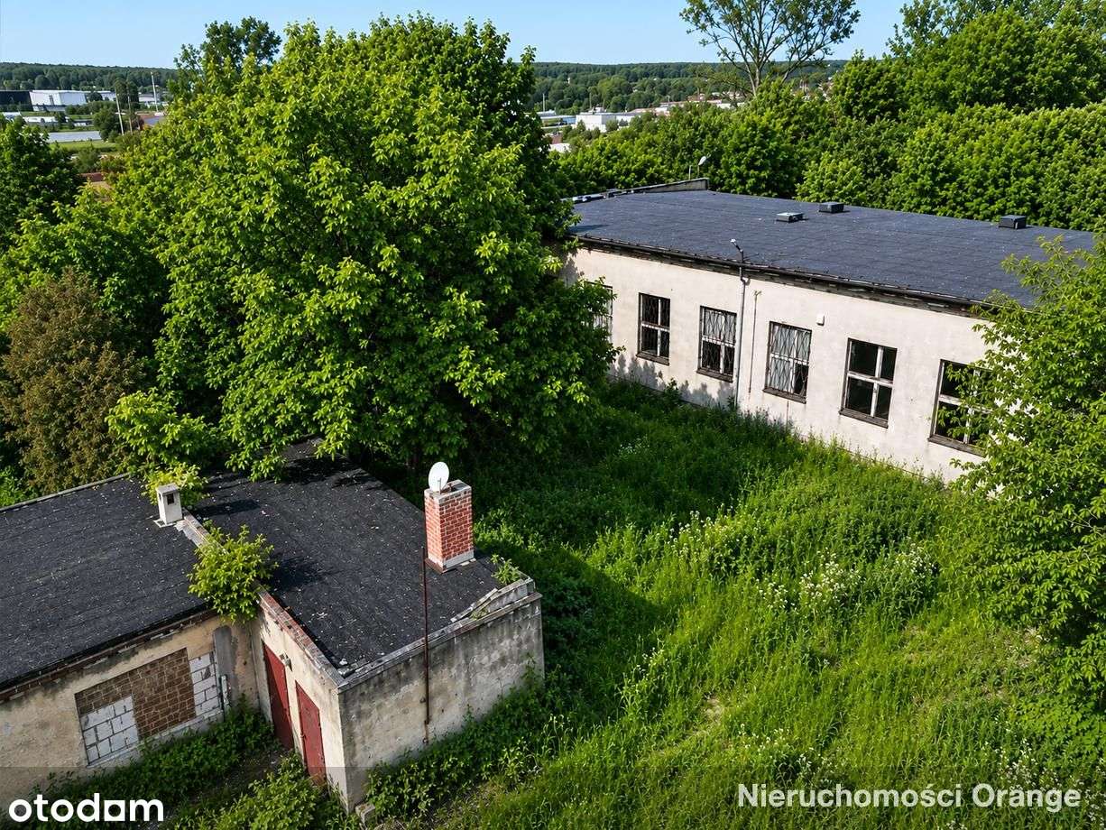 Działka z budynkiem biurowym w centrum Przedborza