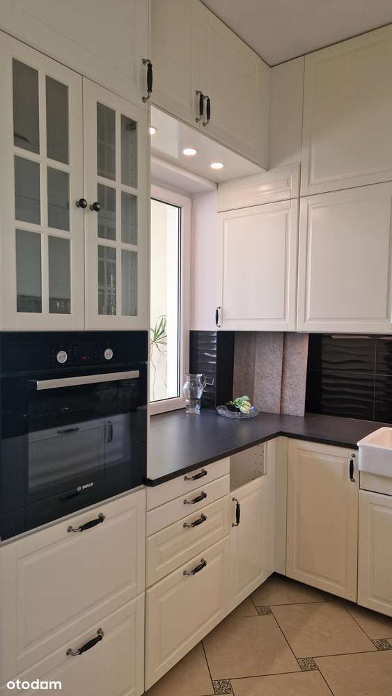 Stylowy apartament w kamienicy z loggią-11