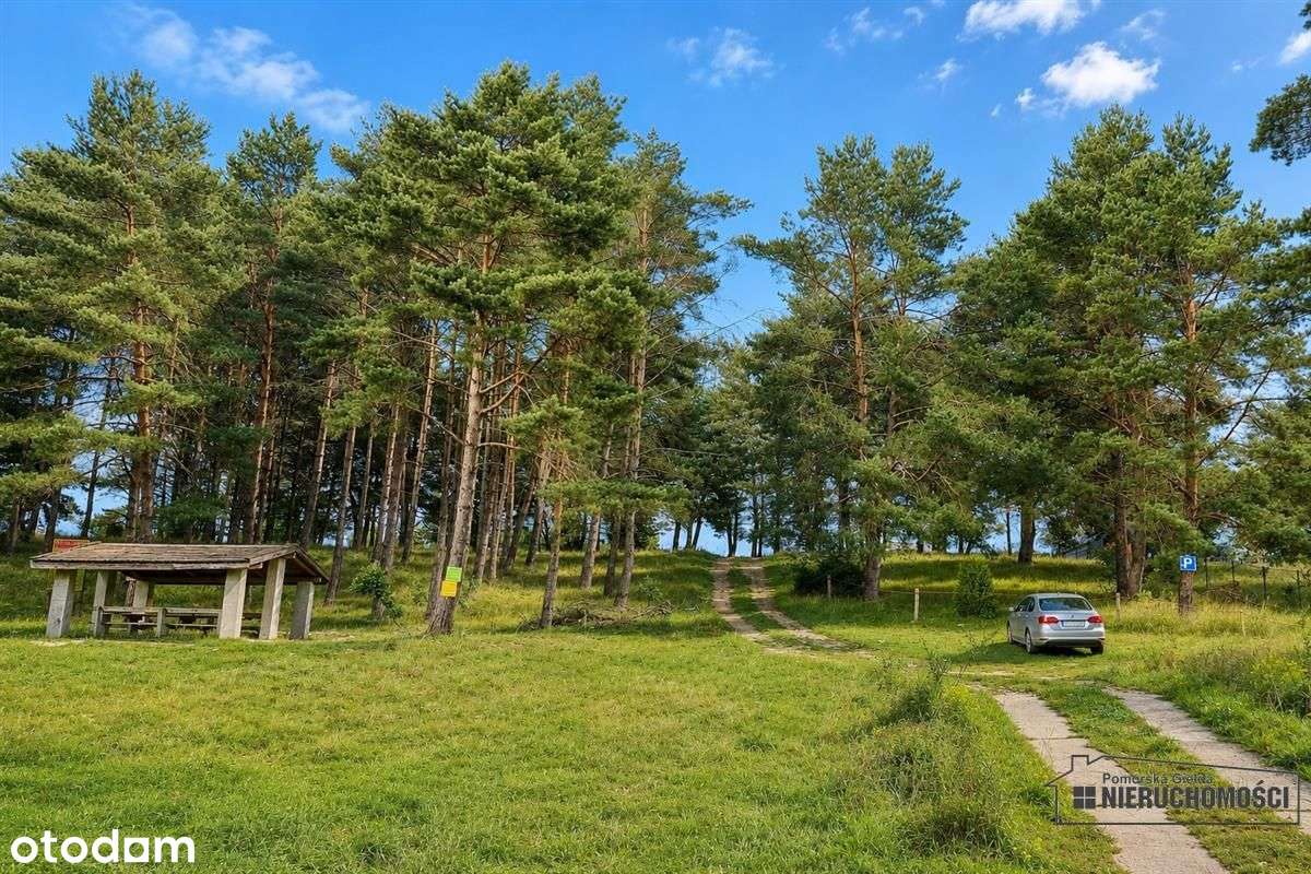 Działka budowlana nad pięknym jeziorem Dołgie.-5